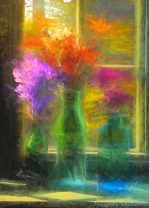 An Impressionistic image of colorful flowers in colored glass bottles reflected in a window. 