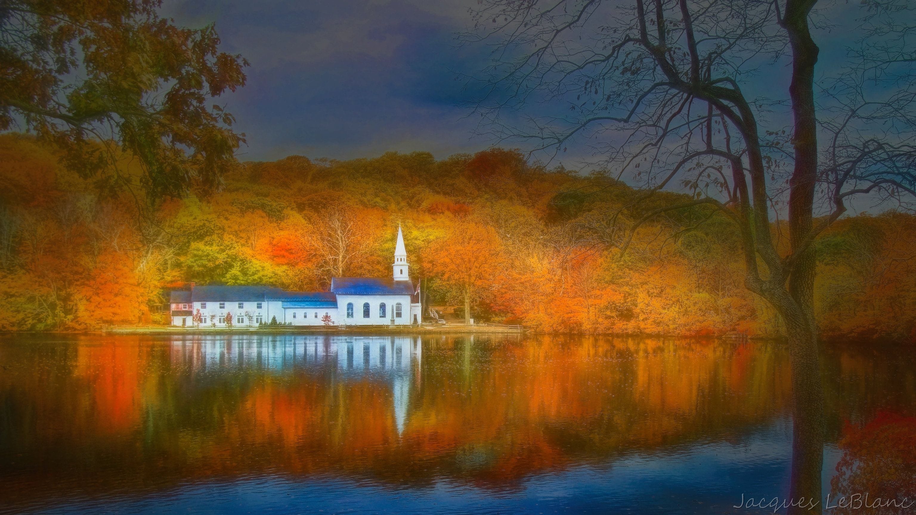 Cold Spring Harbor church surrounded by fall colors.